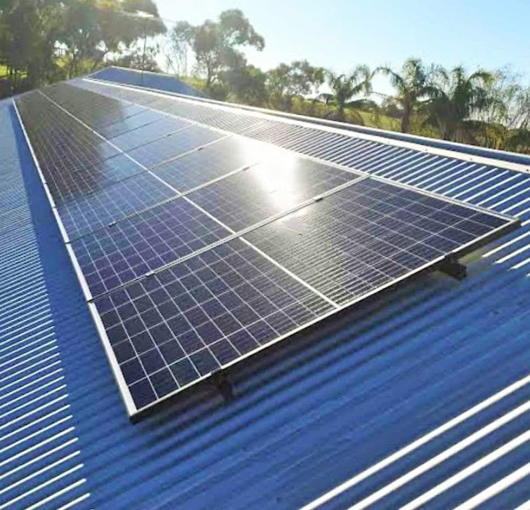 Solar panes on tin sloping tin roof