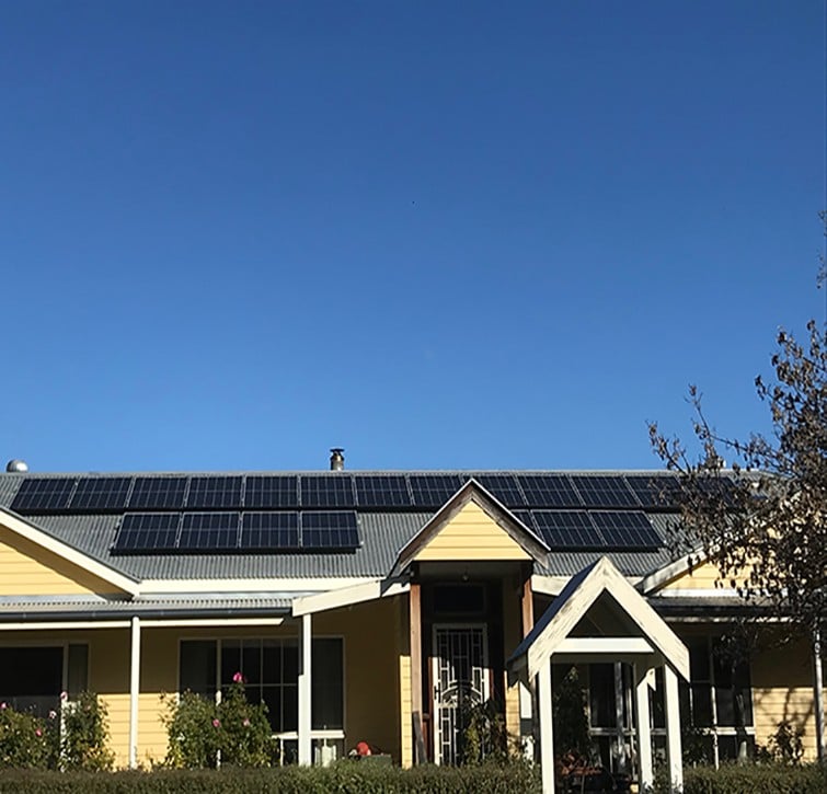 Solar panels on wooden house